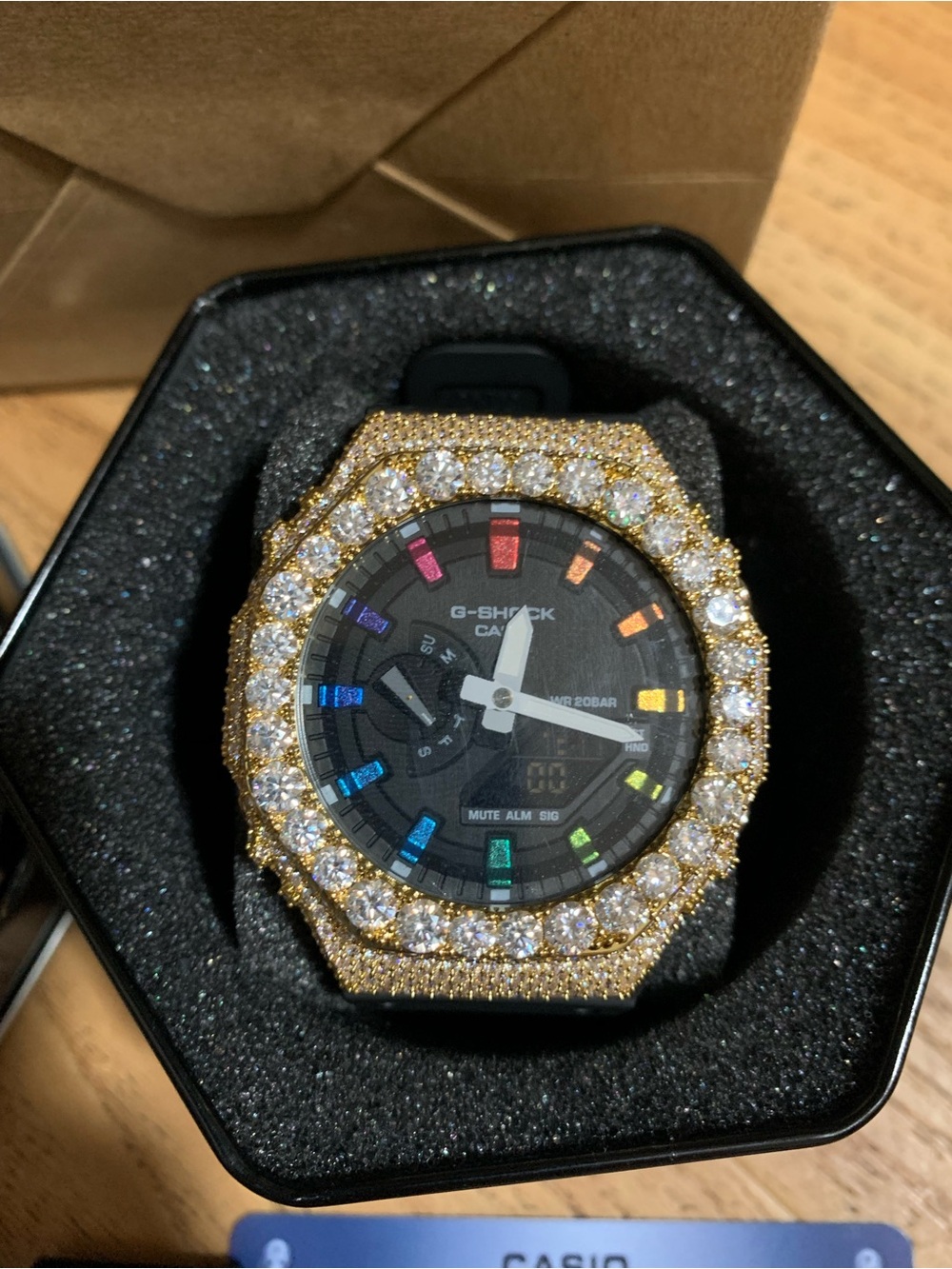 Casio G-Shock Black Watch with Gold Crystal Bezel and Rainbow Markers